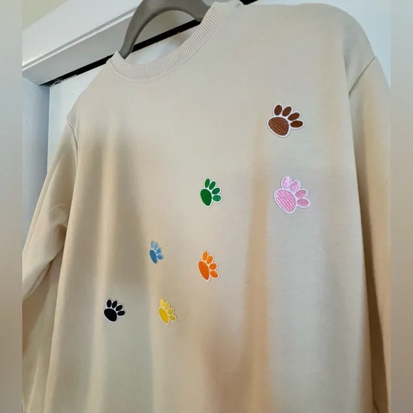 NWOT-Cream Sweatshirt with Colorful 
Embroidered mini Paw Prints - Picture 3 of 9